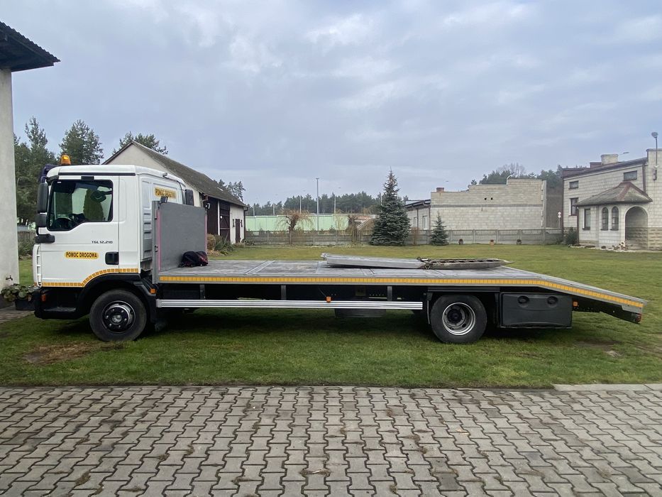 Pomoc drogowa, holowanie, laweta transport maszyn budowlanych rolnicze