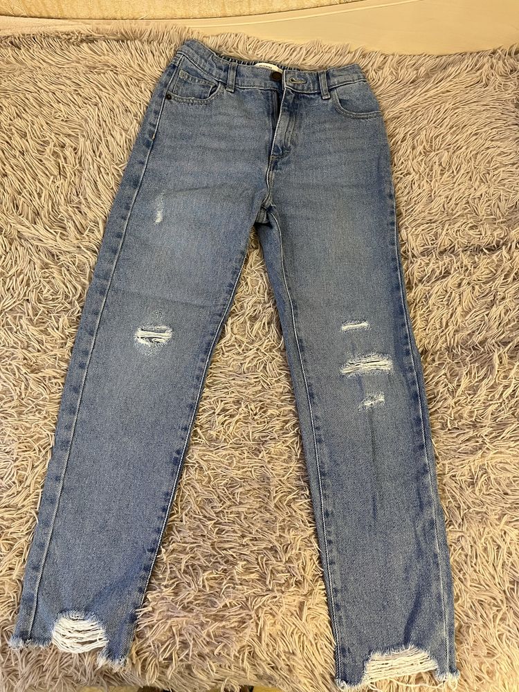 Рваные джинсы для девочки