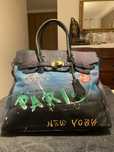Mala tipo “kellybag”