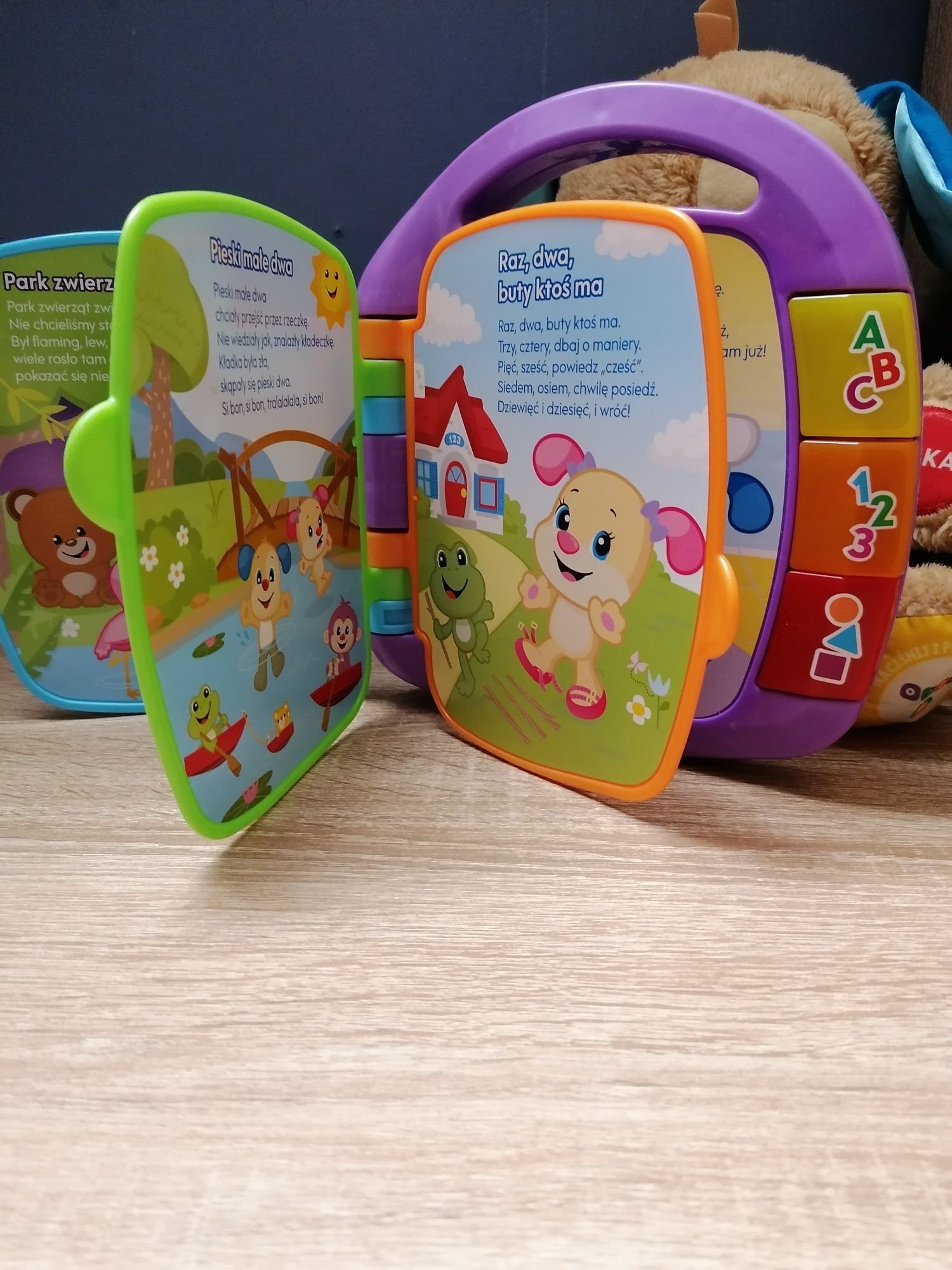 Książka oraz piesek Fisher-price