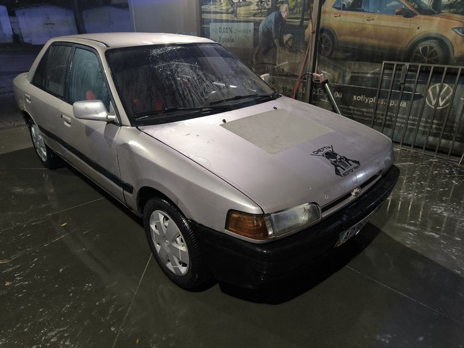 Продам Mazda 323.  Газ/Бенз. Гур.