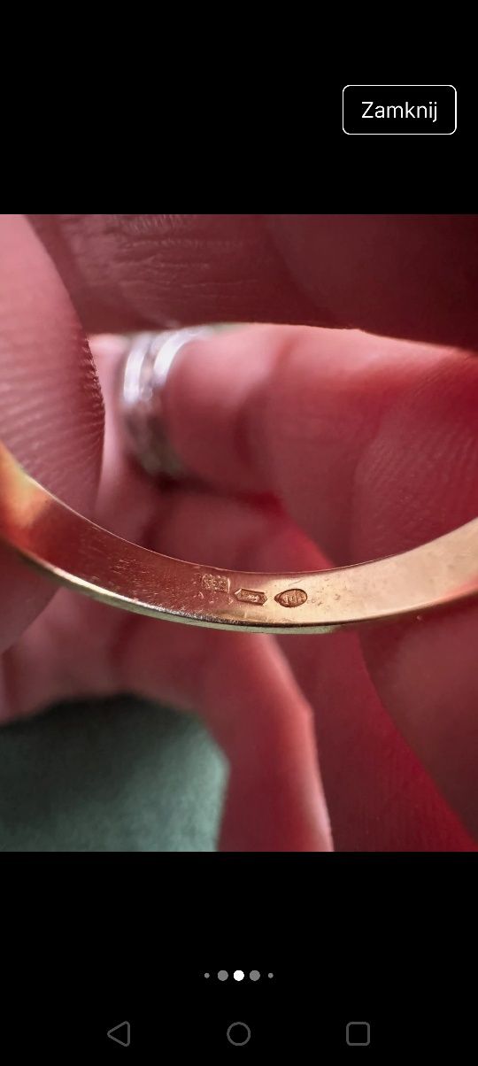 Złoty pierścionek z brylantem