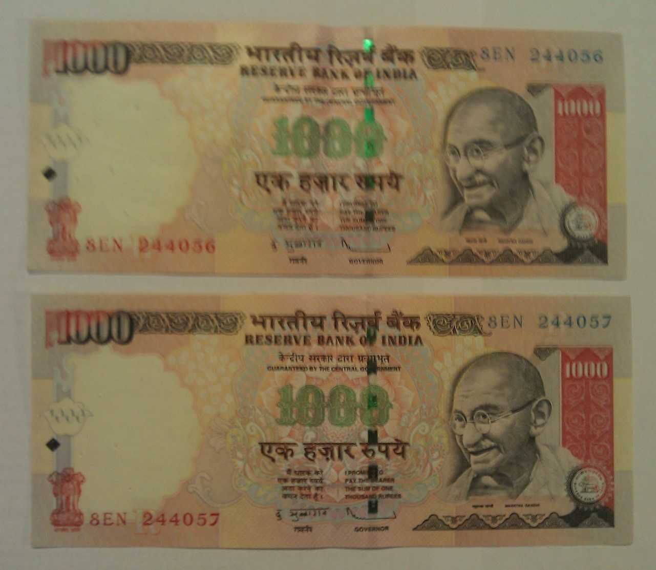 Banknoty indyjskie: 1.000, 100 i 10 rupii