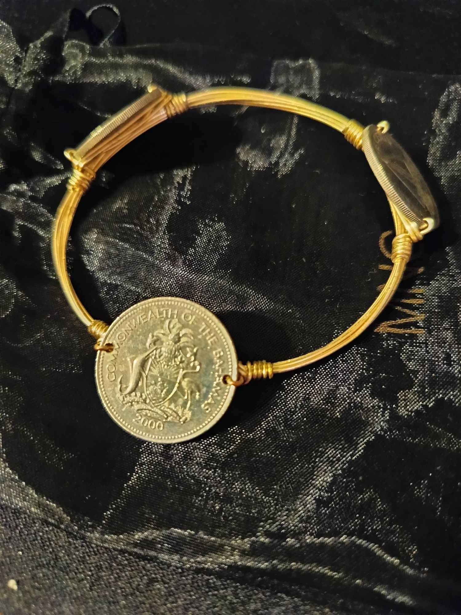 Pulseira de aço prateado