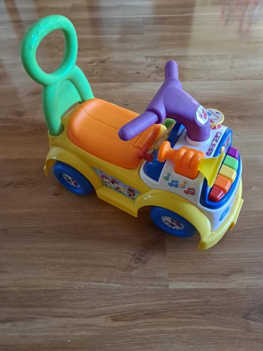 Jeździk, pchacz fisher price muzyczna parada