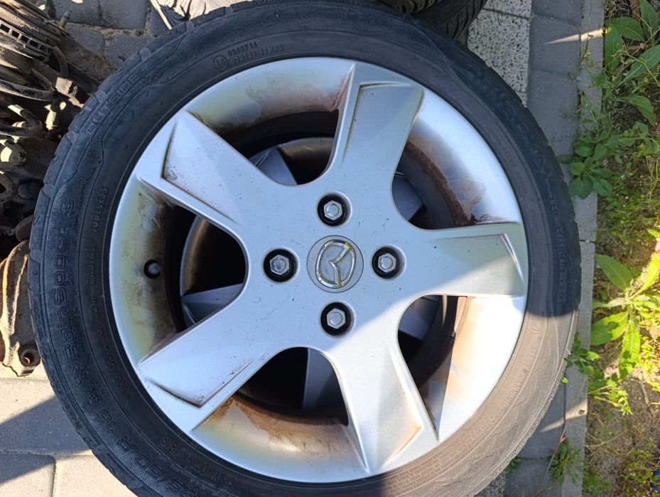 Alufelgi Mazda 2 4x108 15 nakrętki