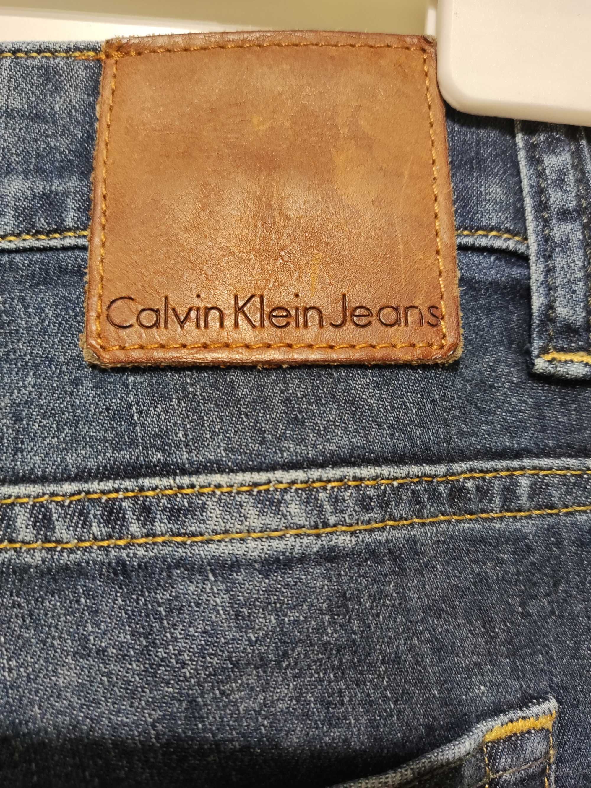 Granatowe jeansy Calvin Klein , nowe, nieużywane, atrakcyjna cena