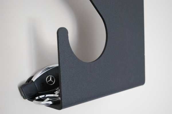 Nowoczesny wieszak na ubrania Wave - modern stalowy malowany proszkowo