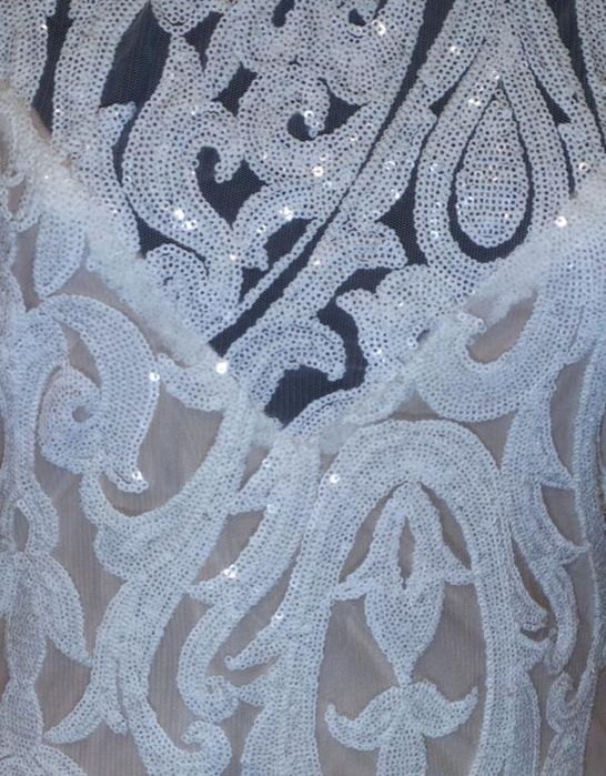 Блискуча ажурна сукня в паєтки