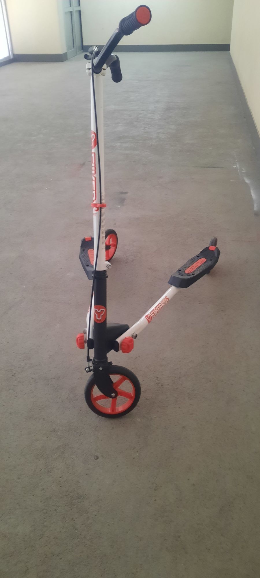 Scooter Fliker SP5 Sport  articulada de 3 rodas