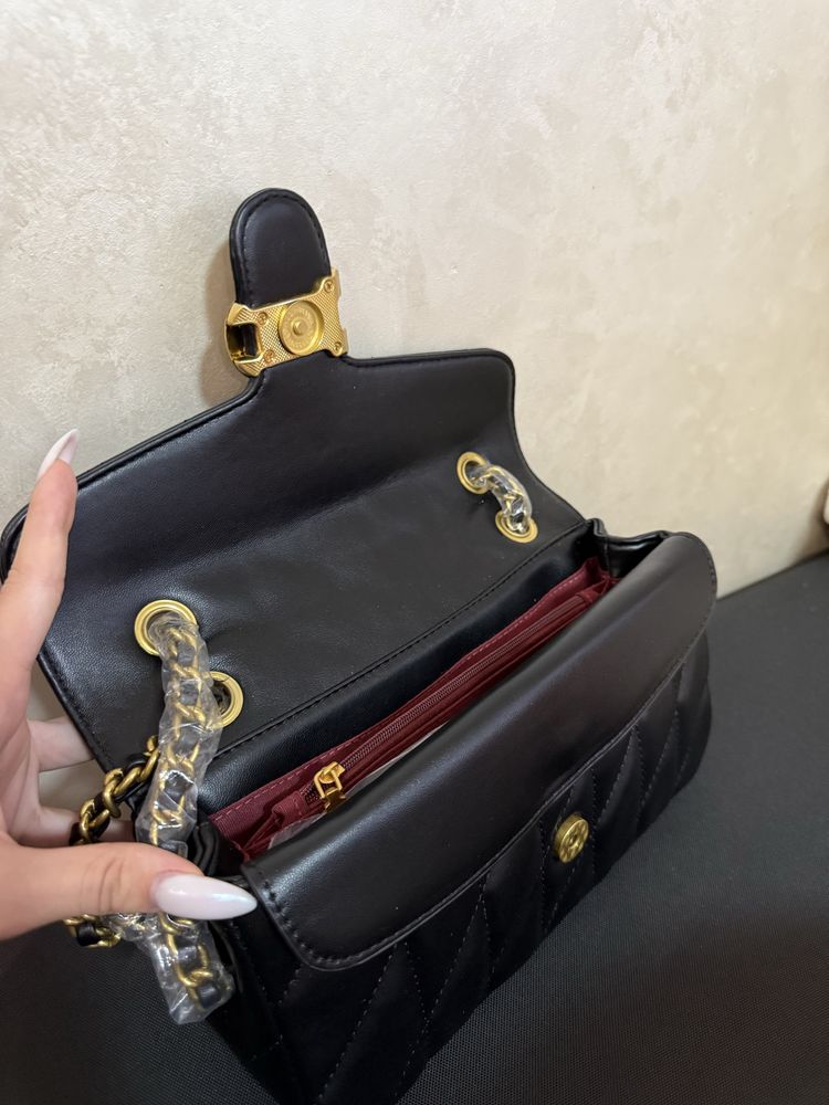 Сумка Coach.