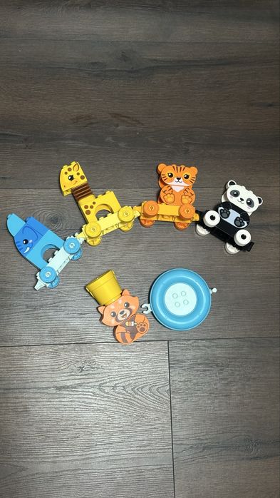 LEGO DUPLO потяг з тваринами та єнот для купання