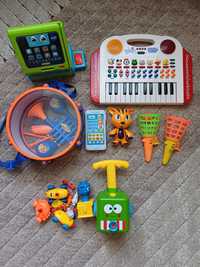 Zestaw zabawek kasa sklepowa vtech, telefon Fisher price, instrumenty