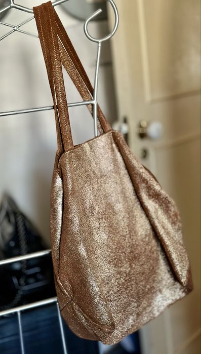 Mala pele dourada Zara