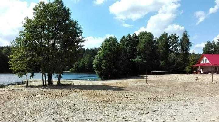 domki letniskowe nad samym jeziorem, las, plaża-wszystko teren prywatn
