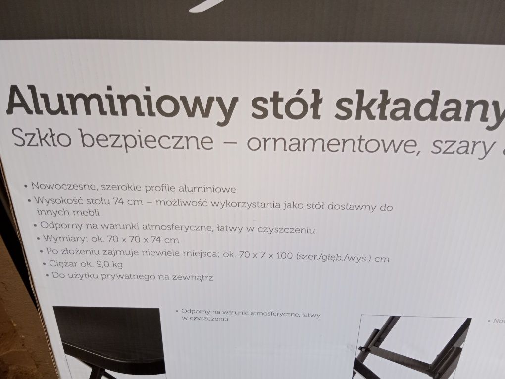 Nowy aluminiowy stół ze szklanym blatem