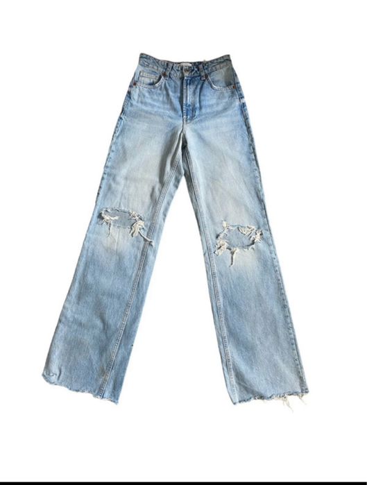 spodnie z dziurami wysoki stan dżinsy jeansy zara niebieskie jasne