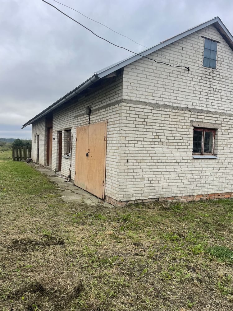 Будинок ,земельна ділянка під забудову
