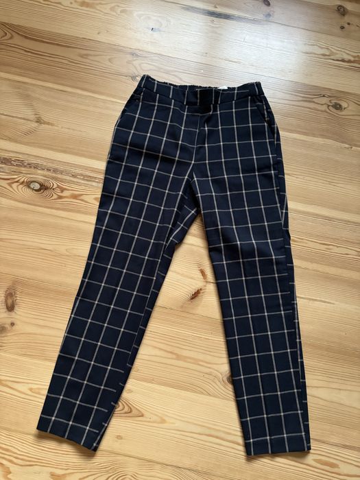 Granatowe spodnie w kratkę Reserved 34