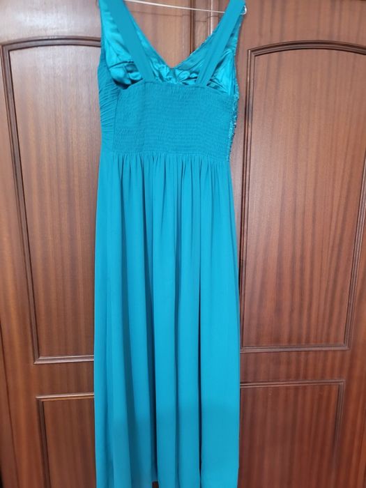 Vestido veste desde S ao M atras é elástico