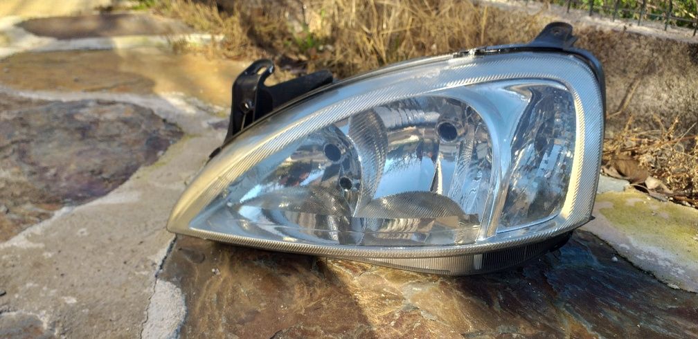 Farol esquerdo Opel  Corsa 1.3 CDTI