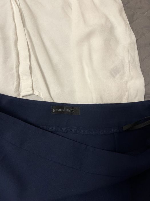 Спідниця міді з розрізом стан нової