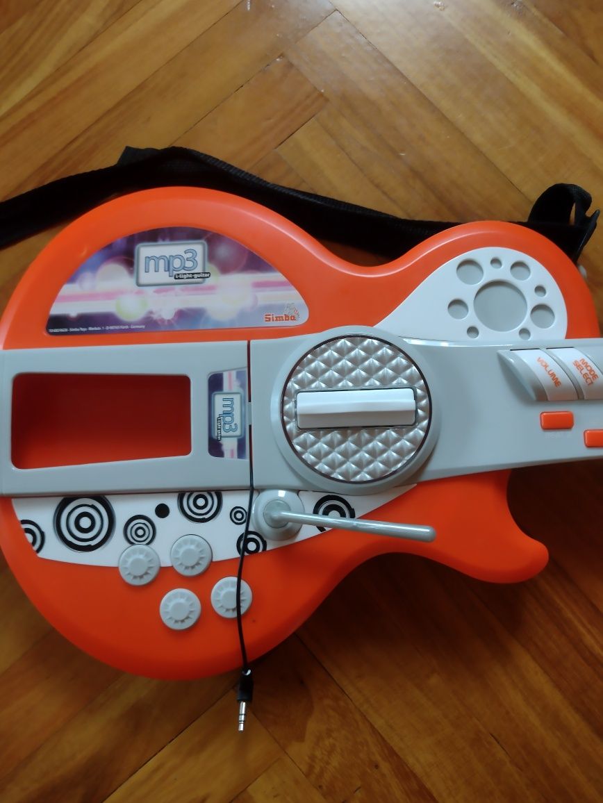 Gitara grająca Simba na baterie z MP 3 stan idealny