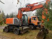 Hitachi Hitachi ZX140 W Koparka Kołowa  Koparka Kołowa Hitachi ZX140 W stan B. Dobry łamane ramie podpory