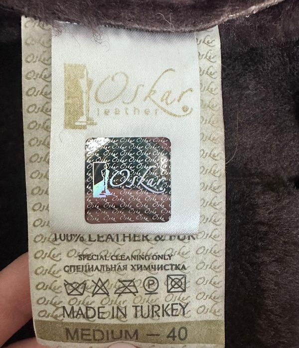 Натуральна дублянка з хутром єнота.