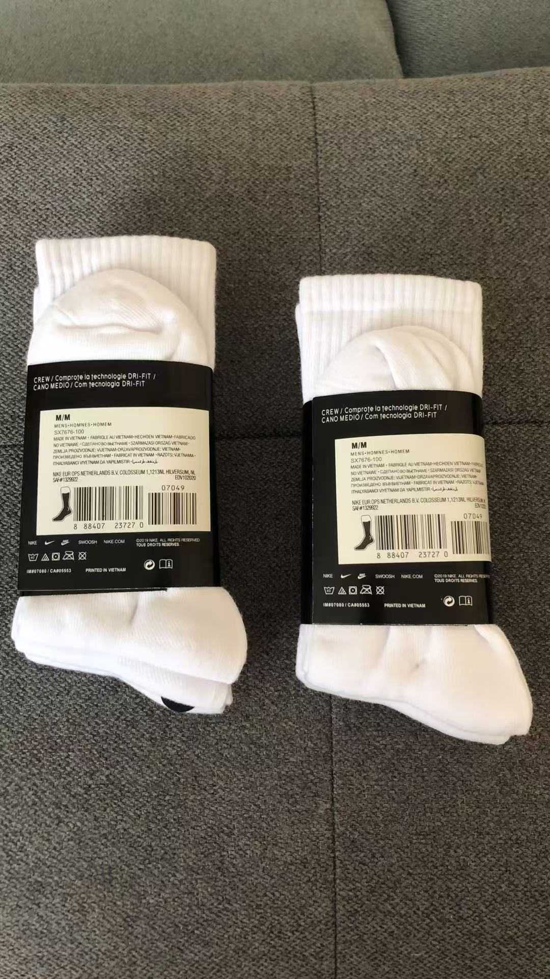 9 par skarpet Nike z czystego bawełny. Białe, długie, Rozmiar M / L