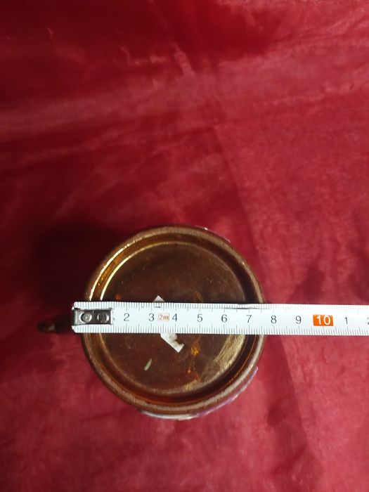 Miedziany dzban z lwen kryty politurą