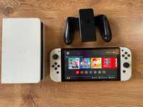 Nintendo Switch Oled biały + 2 gry Mario  Fitnes Boxing 2
