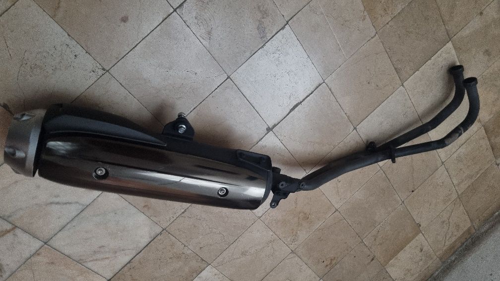 Tmax 530 escape origem