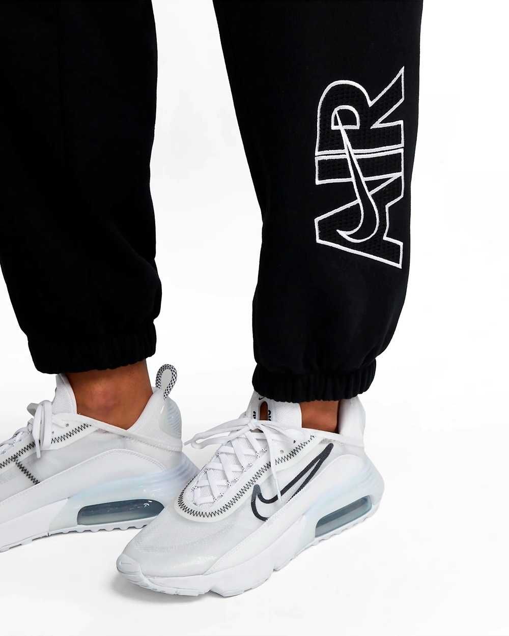 Damskie spodnie dresowe Nike Air czarne: różne rozmiary