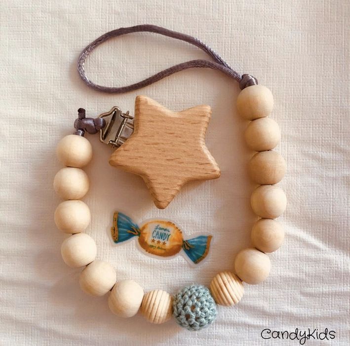 Prende-chuchas em Madeira bebé