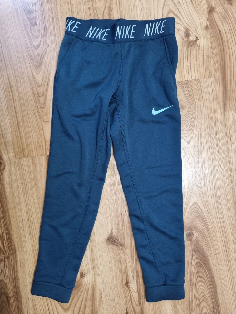 Spodnie dresy Nike 128-137cm 8-10lat jak nowe turkus