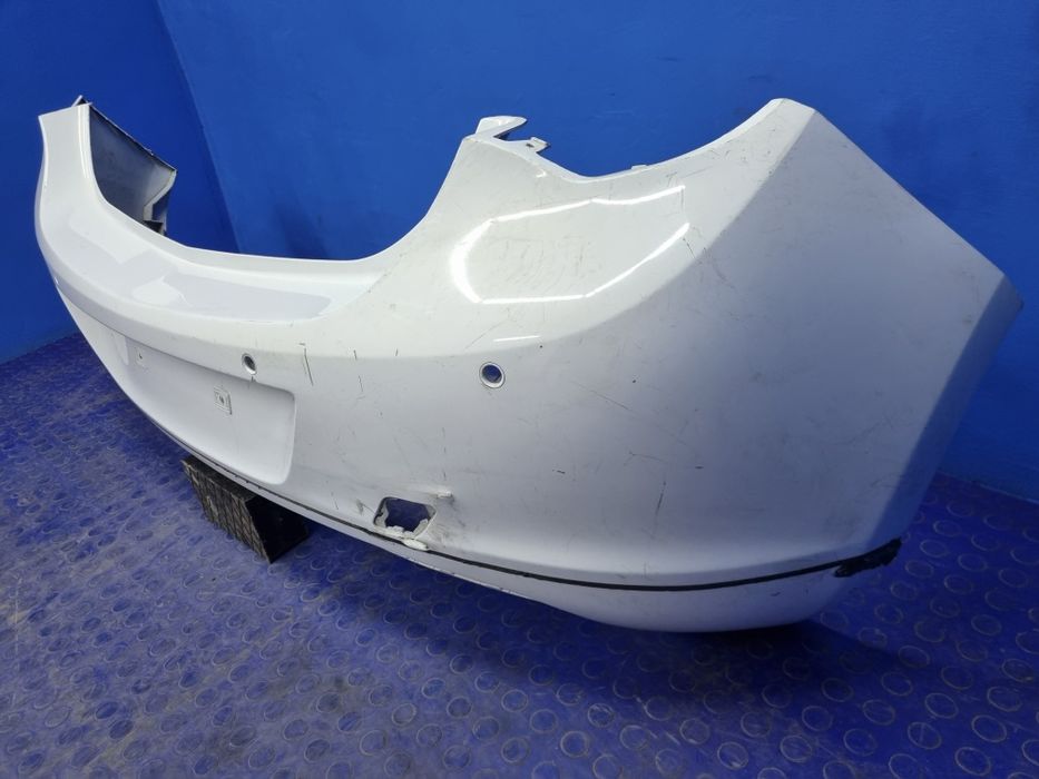 ZDERZAK tylny OPEL Astra J tył 4 PDC Oryginał
