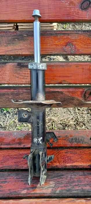 Стійка амортизаційна, амортизатор підвіски передні Nissan Tiida