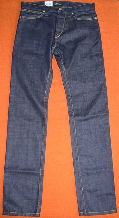 NOWE spodnie jeansowe Lee Macky, w pasie 84 cm. (W32L34)