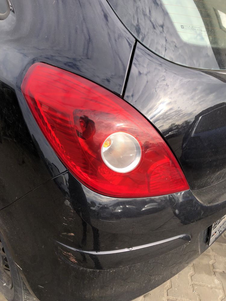 Lampa lewa tylna tył Opel Corsa D 3D