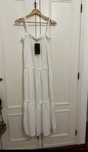 Vestido novo com eriqueta