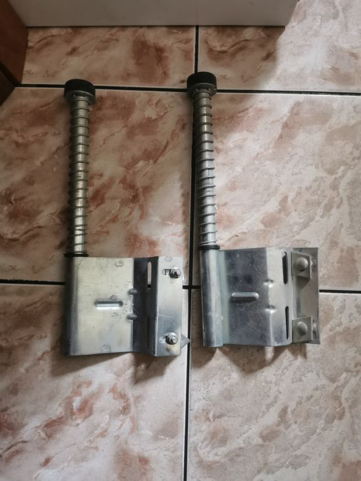 Odbojniki sprężynowe do bramy garażowej