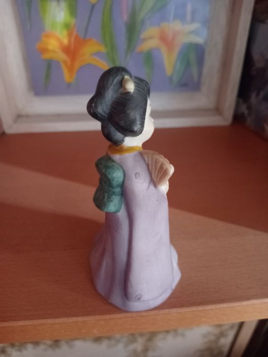 Chinesa de chamada em loiça