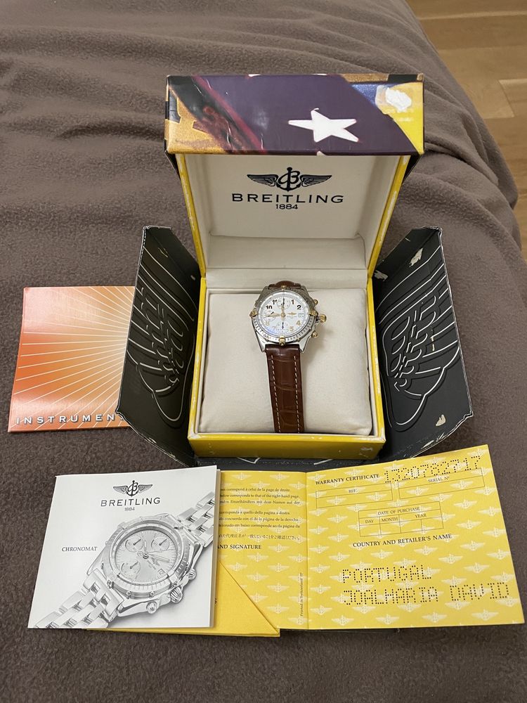 Relogio breitling cronomat aço e ouro e raymond weill modelo othelo.