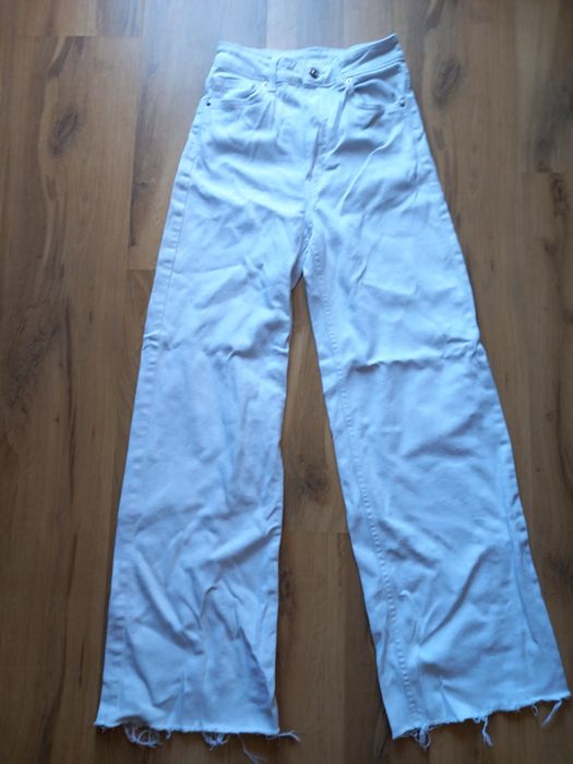 Biale jeansy H&M 32
