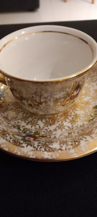 Chávena de café douradas