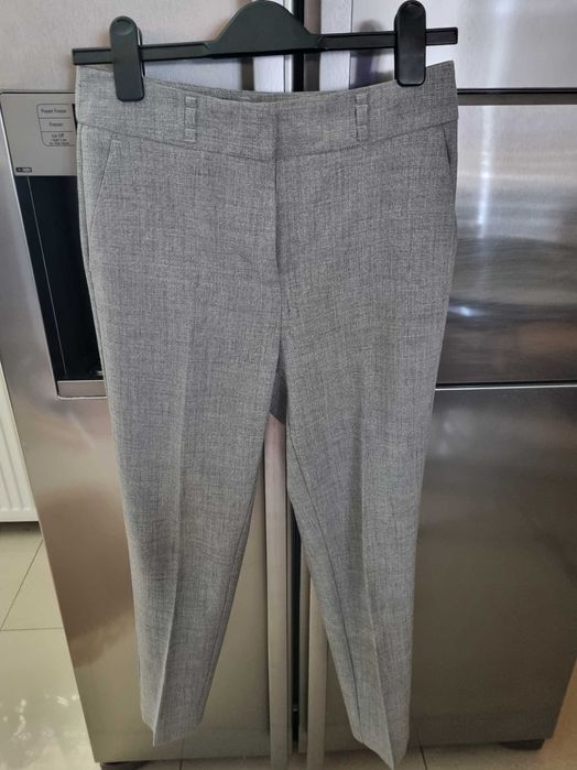 Sprzedam paczkę 10 par spodni roz. 36