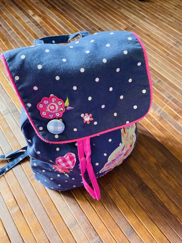 Mochila de tecido com alças ajustáveis! Excelente!!