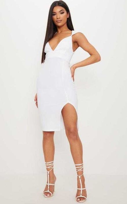 Шикарне біле плаття по фігурі з розрізом сексі платье