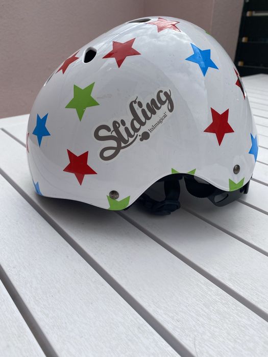 Caparece de bicicleta para crianca